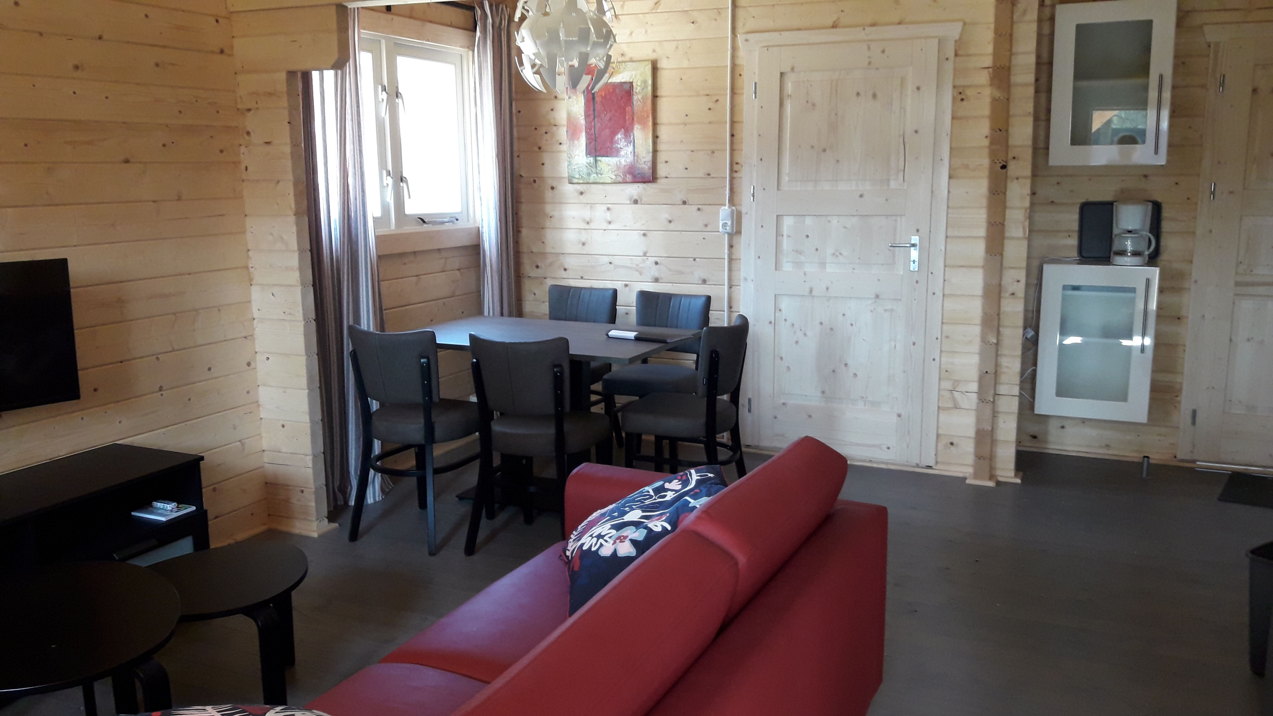 Woonkamer in een Finse Cottage op 't Urkerbos